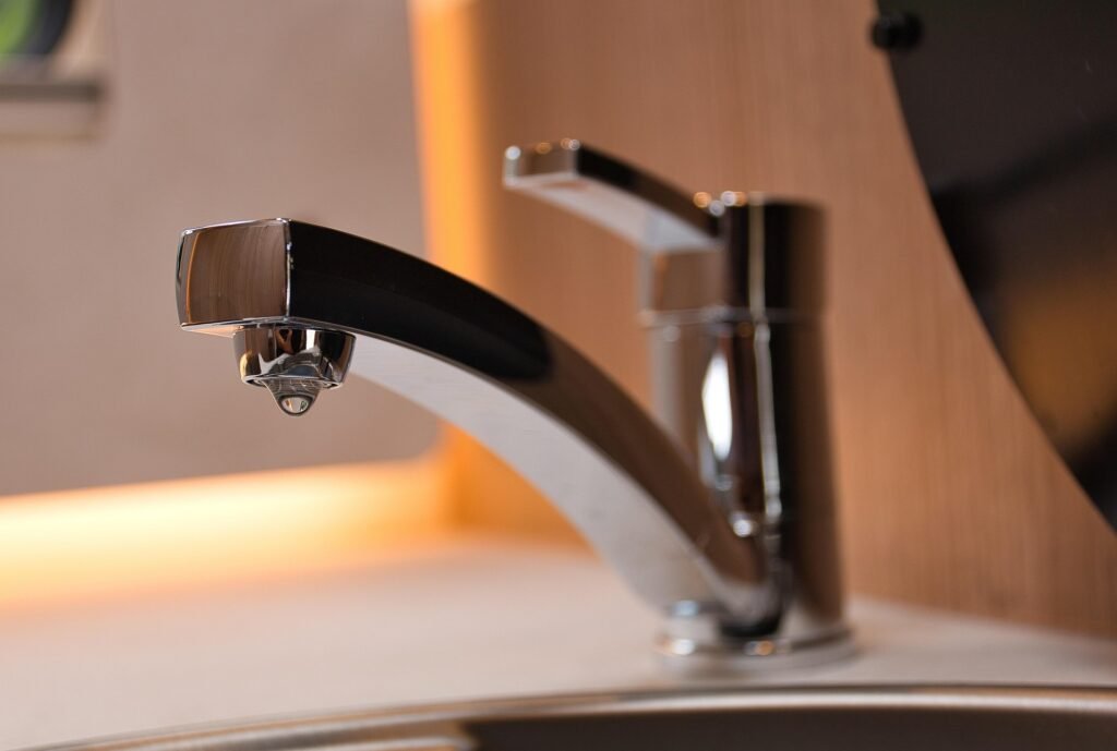 DIY plumbing tips for fixing minor leaks under sink in Sioux Falls home